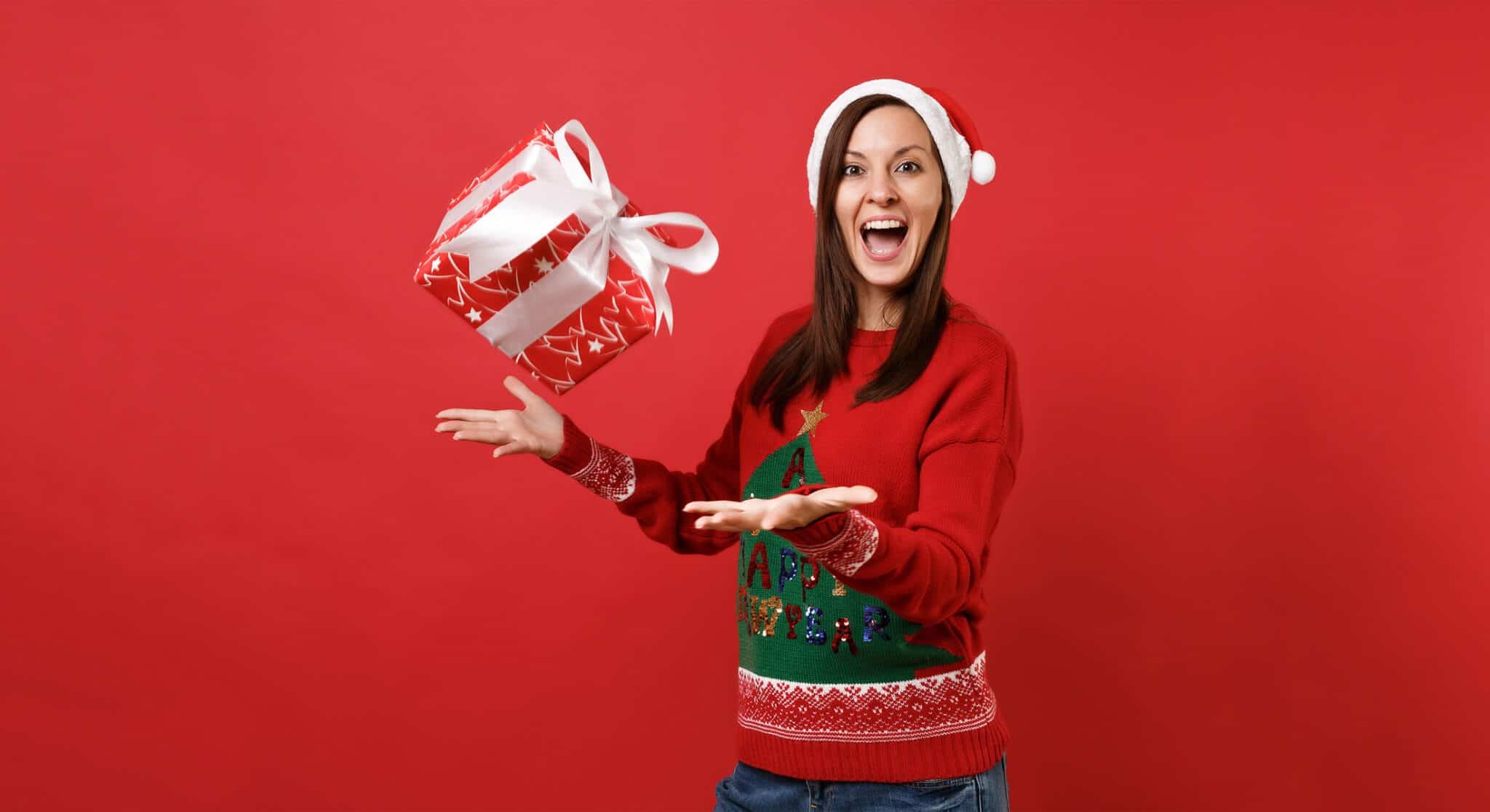 Frau mit Weihnachtsgeschenk Frau mit Weihnachtsgeschenk